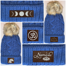 Load image into Gallery viewer, Buddha Gear Plush Blue, Blanket Lined Cable Knit, Pom Pom Beanie with Unicorn, Om, Phoenix, Namaste, Lotus, Tree of Life, Moons, Infinite Heart or Cristian Fish/ichthus Buddha Wear Buddha Beanies