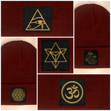 Load image into Gallery viewer, burgundy beanie w golden compass by buddha gear eye of horus merkaba mushrooms flower of life om yoga hat