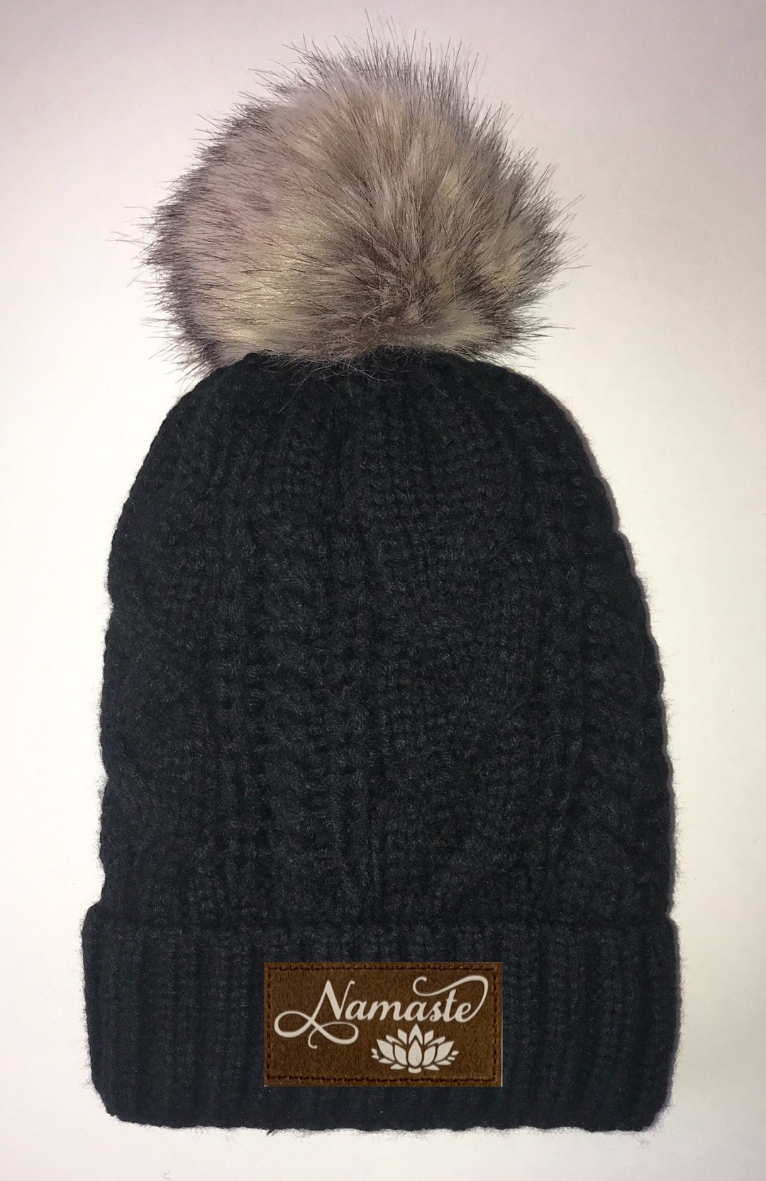Black, Cable Knit, Blanket Lined Pom Pom Beanie with Moons, Namaste, Infinite Love, Unicorn, Tree of Life, Coffee, Om, Cannabis, Utah Mountains, Ganesha, Om, Eye of Horus, Heavily Meditated. All patches are Vegan and Hand Made Buddha Gear Yoga Clothing
