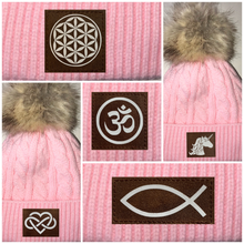 Load image into Gallery viewer, Buddha gear Pink Plush Baby Pom Pom Beanie with Om, Lotus, Moons, Tree of Life, Unicorn, Namaste, Infinite Love, Flower of Life &amp; Ichthus. All Vegan, Hand Made Patches.