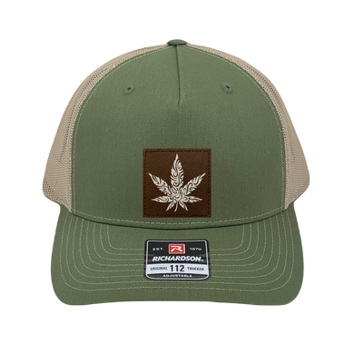 Richardson 112 trucker hat, olive/tan 5 panel with brown and white hand made, vegan leather cannabis patch by Buddha Gear