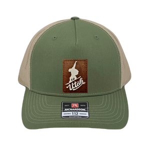 Richardson 112 trucker hat, olive/tan five panel hat with hand made, vegan leather brown/white Utah Snowboarder patch by Buddha Gear